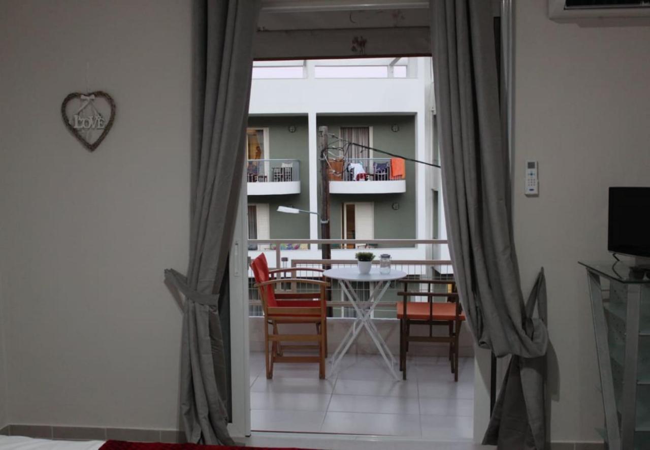 Zoe Apartments تولو المظهر الخارجي الصورة