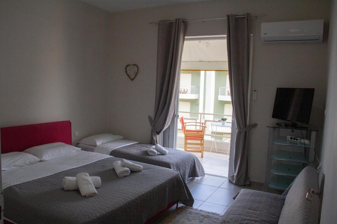 Zoe Apartments تولو المظهر الخارجي الصورة